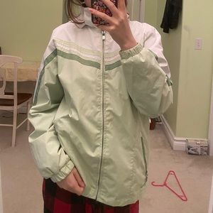green and white rain jacket